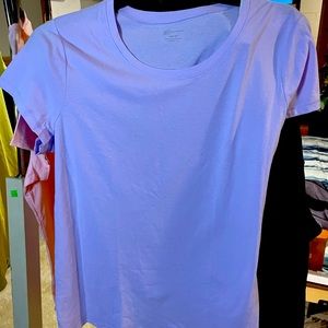 Soft women’s T-shirt custom design of a whale diving in lavender